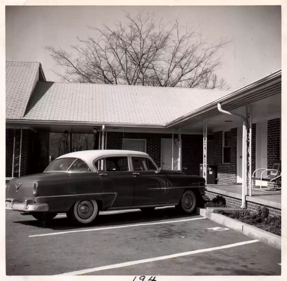 194- car in front of building